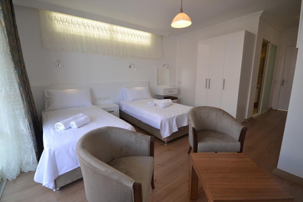 Kelebek Studio Apartments Kalkan Rum bild